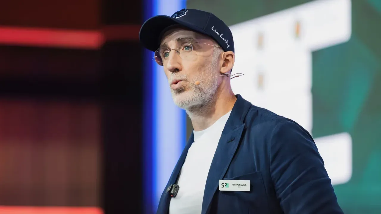 Uri Poliavich speaking at an industry conference
